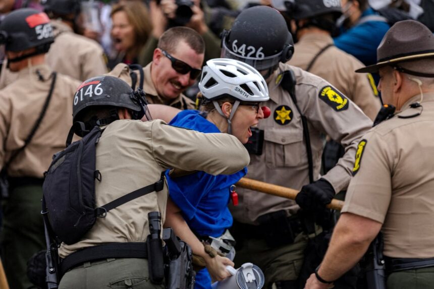at least 11 detained after protesters and police clash outside chicago ice center 68f2a2b930dff