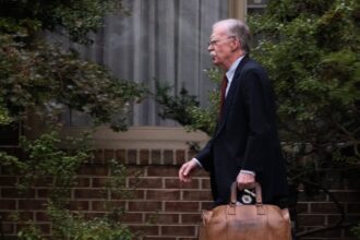 ex trump adviser john bolton surrenders after indictment 68f23d0290ea3