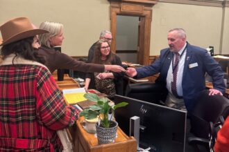 political storm in wyoming as far right activist caught handing checks to lawmakers 69a06612460b9