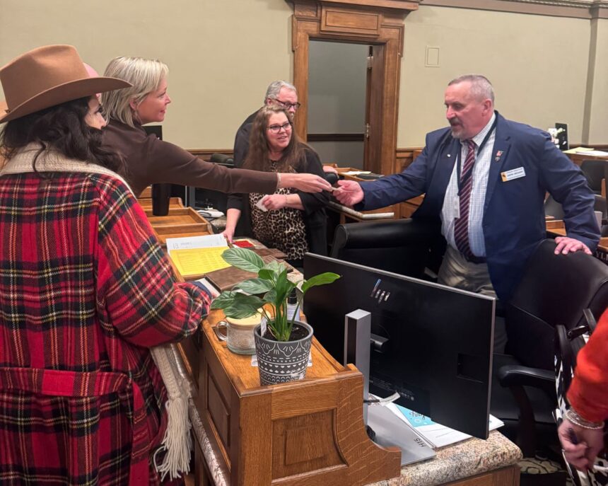 political storm in wyoming as far right activist caught handing checks to lawmakers 69a06612460b9