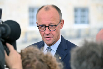 friedrich merz huiduit si ironizat la congresul sindicatelor germane din cauza reformei programului de lucru afd il depaseste in sondaje 6a030cb1afb1b